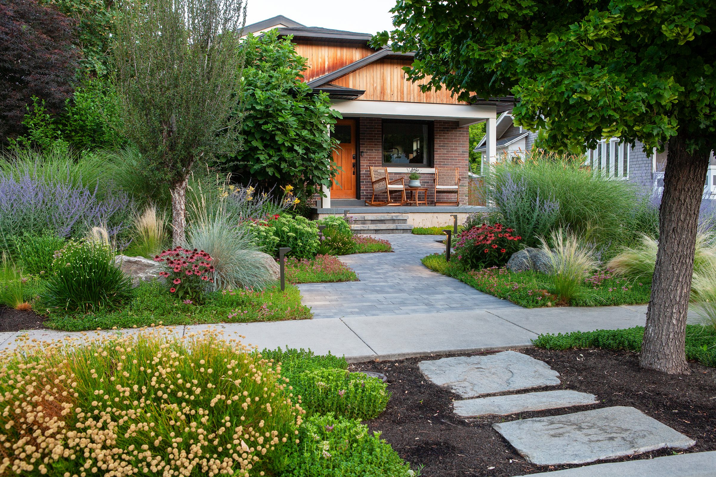 Beautiful garden landscape in front of modern house.